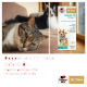 Katze liegt auf dem Sofa neben einer Doppelherz für Tiere Gelenk-Öl-Box (für Katzen und Hunde, 250 ml)