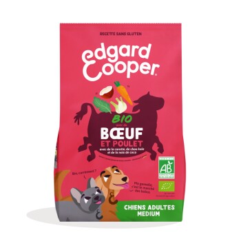 Sac d'aliments pour chiens rose Edgard Cooper portant la mention BIO BŒUF ET POULET ; silhouette de vache, légumes, deux chiens dessinés ; CHIENS ADULTES MOYEN
