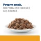 Biała miska z wilgotnym brązowym pokarmem z tekstem 'Pyszny smak, któremu nie sposób się oprzeć.'