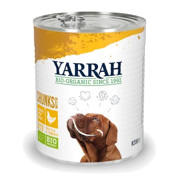 Blik Yarrah bio-organisch hondenvoer met stukjes kip, brandnetel en tomaat, met een bruine hond op het etiket.