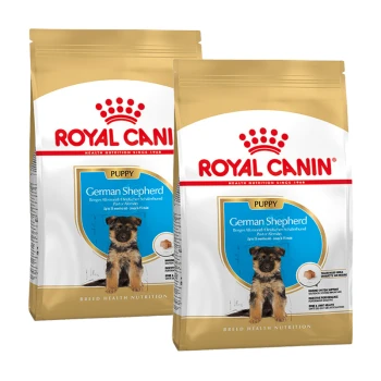 Zwei Säcke Royal Canin Welpenfutter für Deutsche Schäferhunde, mit einem Bild eines Welpen und einem Text, der die Eignung für Hunde bis zu 15 Monaten angibt.