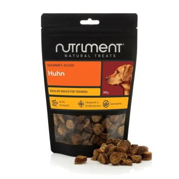 Schwarze Nutrilment-Leckerli-Tüte mit Aufschrift 'Huhn' 200 g, Hunde-Kopf-Abbildung und einem Haufen runder Hähnchenscheiben vorne.