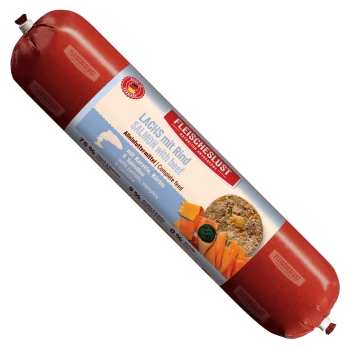 FLEISCHESLUST Futterbox – Holzkiste mit Hunde-Foto und dem Text „Natürlich & Artgerecht“, sowie einer wurstähnlichen Futterrolle mit der Beschriftung „Lachs mit Rind / Salmon with beef“.