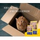 Eine überraschte graue Katze neben einer Notiz mit dem Titel "ZUSAMMENSETZUNG", die die Inhaltsstoffe des Josera Katzenfutters für Erwachsene detailliert.