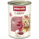 Dose Animonda CARNY Katzenfutter mit Etikett 'Rind + Herz / Beef + Heart', Adult 1+, mit orange getigerter Katze und Fleischstückchen.