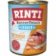 Rinti Kennerfleisch Junior Dosenfutter für Hunde mit Huhn, getreidefrei, mit verschiedenen Fleischstücken auf dem Etikett und "Reich an Omega3."