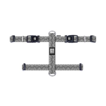 Schwarz-weiß gemustertes Hundegeschirr mit Kunststoffschnallen und Metall-D-Ringen, beschriftet mit "Moshi Moshi Urban Pets".