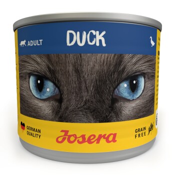 Eine gelbe Dose Josera Katzenfutter mit der Aufschrift "Ente", mit einer Nahaufnahme einer blauäugigen Katze und den Etiketten "DEUTSCHE QUALITÄT" und "GETREIDEFREI".