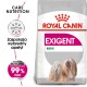 Torba z jedzeniem dla psów Royal Canin Exigent Mini z ilustracją małego psa, z tekstem podkreślającym "Care Nutrition" i "Zaspokaja wybredny apetyt."
