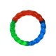 Jouet pour chien anneau tressé « KONG », caoutchouc translucide rouge/vert/bleu avec logo « KONG » en relief