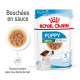 Pochette de nourriture humide Royal Canin Puppy Mini, 85g, adaptée aux chiots âgés de 2 à 10 mois, avec des morceaux tendres dans une sauce et une image de petit chien.