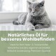 Graue Katze mit orangen Augen liegt über Text, der in Deutsch natürliches Öl für das Wohlbefinden von Haustieren bewirbt.
