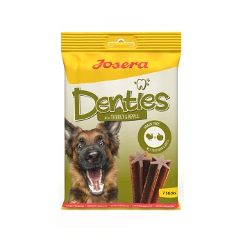 Verpackung für Hundeleckerlis mit einem glücklichen Deutschen Schäferhund, beschriftet "Josera Denties mit Truthahn & Apfel", getreidefrei, 7 Sticks.