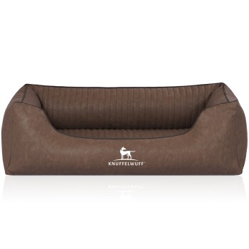 Braunes Hundebett mit einem gesteppten Innenraum und einer glatten Außenseite, mit dem Logo "KNUFFELWUFF" auf der Vorderseite.