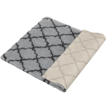 Grau-schwarz gemusterte Haustierdecke mit weicher Fleece-Seite und beiger strukturierter Unterseite, teilweise aufgerollt.