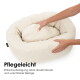 Cremefarbenes, rundes Cord-Haustierbett mit herausnehmbarem Innenkissen, Hände richten es; sichtbarer Text „Pflegeleicht“ und ein deutscher Reinigungshinweis.