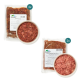 Zwei Pakete rohes Rindfleisch für Haustiere, jeweils mit der Aufschrift 'Rindermuskelfleisch Extra, Netto 500 g', mit einer Schüssel mit Hackfleisch in der Mitte.