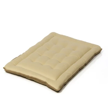 Beiges Haustierbett mit einem gepolsterten Design, mit weicher Polsterung und einer einfachen, eleganten Form, geeignet für Hunde oder Katzen.