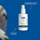 Canina PETVITAL Bio Fresh & Clean weiße Sprühflasche vor blauem Hintergrund; Text: „Reinigt effektiv & entfernt Gerüche.“