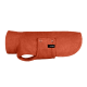 Ein weicher, orangefarbener Hundemantel mit einem runden Kragen und einer Tasche, mit dem Etikett 'THE DOG IDEA.'