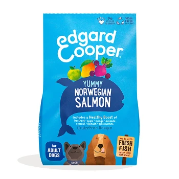 Dog food bag featuring "Edgard Cooper Yummy Norwegian Salmon" with illustrations of fruits and vegetables, labeled grain-free recipe for adult dogs.