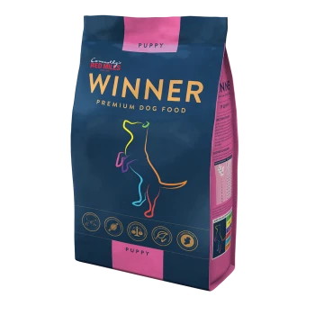 Colorful bag of "Winner" premium dog food for puppies, featuring a playful dog graphic and icons for nutritional benefits.