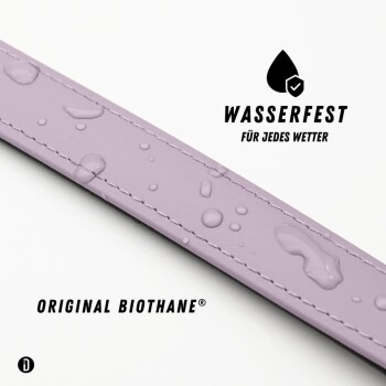 Nahaufnahme eines schwarzen Haustierhalsbands mit geflochtener Textur und einer weichen lila Innenauskleidung, die sein stilvolles Design zeigt.