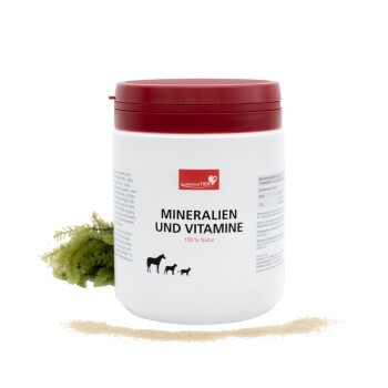 Weißer Kunststoffbehälter mit Mineralien und Vitaminen für Haustiere, beschriftet mit "Mineralien und Vitamine 100% Natur" mit Hundesilhouetten und deutschem Text.
