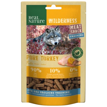 Real Nature Wilderness Pure Turkey meat snack for dogs, featuring a wolf in the background, with 90% turkey, 10% vegetables, and no added grains.