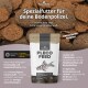 NatureHolic PLECO-FUTTER-Beutel mit Zebra-Pleco über braunen Tabletten; deutscher Text ‚Spezialfutter für deine Bodenpolizei.‘