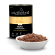 Karma w puszce dla kota „catz finefood Pure Huhn” z olejem z wiesiołka, pokazana z miską mokrej karmy dla kota.