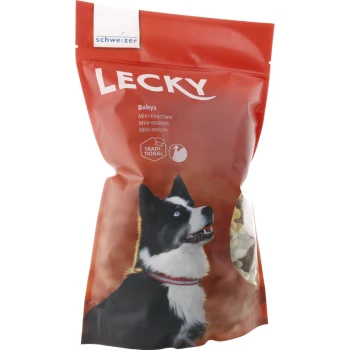 Emballage rouge de friandises pour chien LECKY présentant un chien noir et blanc aux yeux bleus, étiqueté "Babys Mini-Knöchelchen."