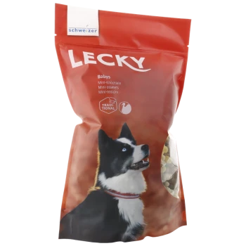 Rote Verpackung von LECKY-Hundeleckerlis mit einem schwarz-weißen Hund mit blauen Augen, beschriftet mit "Babys Mini-Knöchelchen."