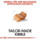 Kibble für Bulldoggen mit dem Text "SPEZIELL FÜR IHRE BULLDOGGE ENTWICKELTE KROKETTE" und "TAILOR-MADE KIBBLE."