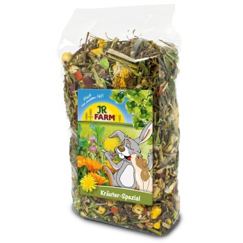 A clear bag of colorful dried herbs and flowers for pets, labeled "JR FARM Kräuter-Spezial," with a cartoon rabbit and dog.