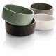 Vier stilvolle Futternäpfe für Haustiere in Grün, Schwarz, Grau und Weiß, jeweils mit einem subtilen, geprägten Hundedesign.