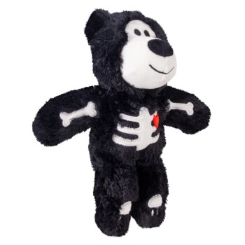 Black plush dog toy bear with white smiling face, stitched skeleton bones and small red heart on its chest.