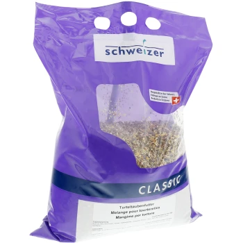 Sac violet de nourriture pour tortues étiqueté "CLASSIC" avec du texte en allemand, français et italien, présentant un mélange de graines et de céréales.