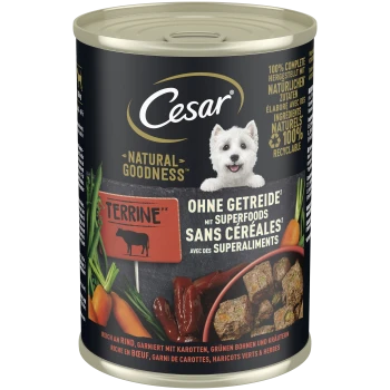 Puszka karmy Cesar Natural Goodness z wizerunkiem białego teriera, etykietą 'Terrine' oraz napisem 'Ohne Getreide / Sans Céréales'.