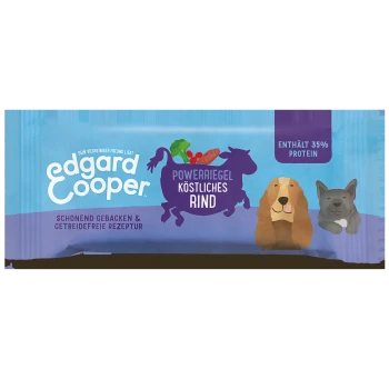 Edgard Cooper Power Bar für Hunde, mit einer blauen Verpackung mit Illustrationen eines Hundes und einer Katze, die "Köstliches Rind" und "Enthält 35% Protein" angibt.