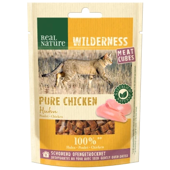 Real Nature Wilderness Pure Chicken pet treat packaging featuring meat cubes, with a wild cat image and text indicating 100% chicken.