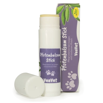 Weißer Pfotenbalsam-Stick mit lila Etikett 'Pfotenbalsam Stick', Marke 'VeaVet', Pfotenabdruck-Symbole und passender Verpackung mit Blatt-Design.
