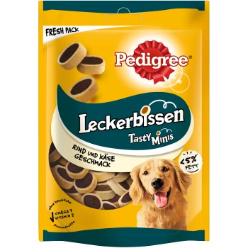 Friandises pour chiens Pedigree Tasty Minis dans un sac jaune, avec un golden retriever, portant les inscriptions "Leckerbissen" et "Rind und Käse Geschmack," 25% de matières grasses.