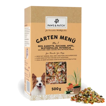 Paws & Patch 'Garten Menü' 500 g Hundefutterbox, Sichtfenster zeigt gemischte Gemüseflocken, Abbildung eines lächelnden Hundes