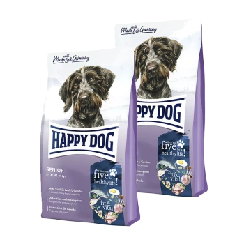 Zwei Säcke Happy Dog Senior Hundefutter mit einem braun-weißen Hund auf der Vorderseite, mit Text, der Gesundheitsvorteile und Zutaten hervorhebt.