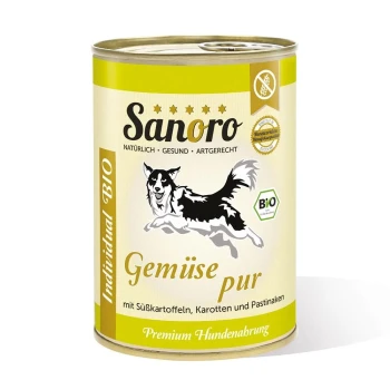 Dose Sanoro Hundefutter mit der Aufschrift "Gemüse pur" mit Süßkartoffeln, Karotten und Pastinaken. Mit einer Grafik eines springenden Hundes und "BIO"-Zertifizierung.