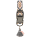Dog collar with geometric pattern in pink, gray, and beige, featuring a black buckle and gray and pink tassel charm.