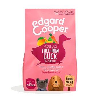 Edgard Cooper puppy food bag with a pink background, featuring duck, veggies, and text: "Fabulous Free-Run Duck & Chicken," "Grain-Free."
