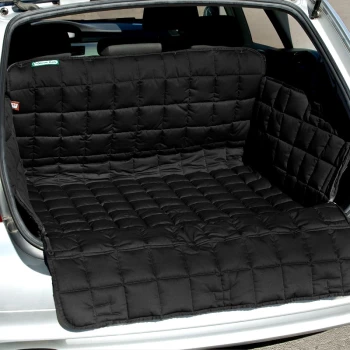 Housse de siège de voiture pour animaux en noir matelassé, ajustée à l'arrière d'un véhicule, conçue pour protéger le rembourrage des poils et de la saleté des animaux.