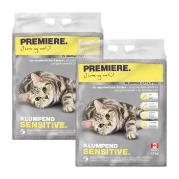 Sensitive klompvormende kattenbakvulling 2x12 kg Twee zakken PREMIERE klonterende kattenbakvulling gelabeld "KLUMPEND SENSITIVE" met een speelse tabby kat op de voorkant, met meertalige tekst.